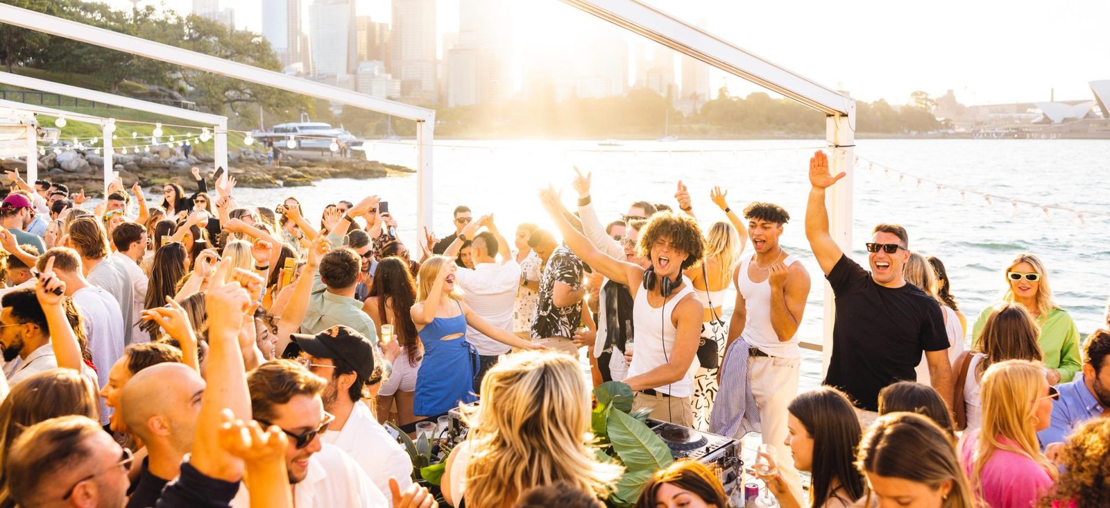 Golden hour harbour party, Juay Kennedy on the decks